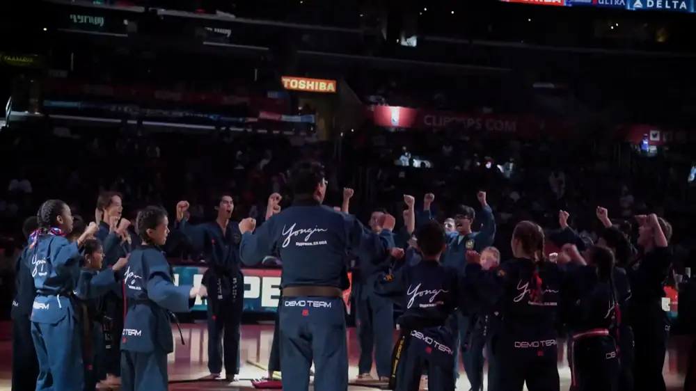 Students walking off the floor after the performance