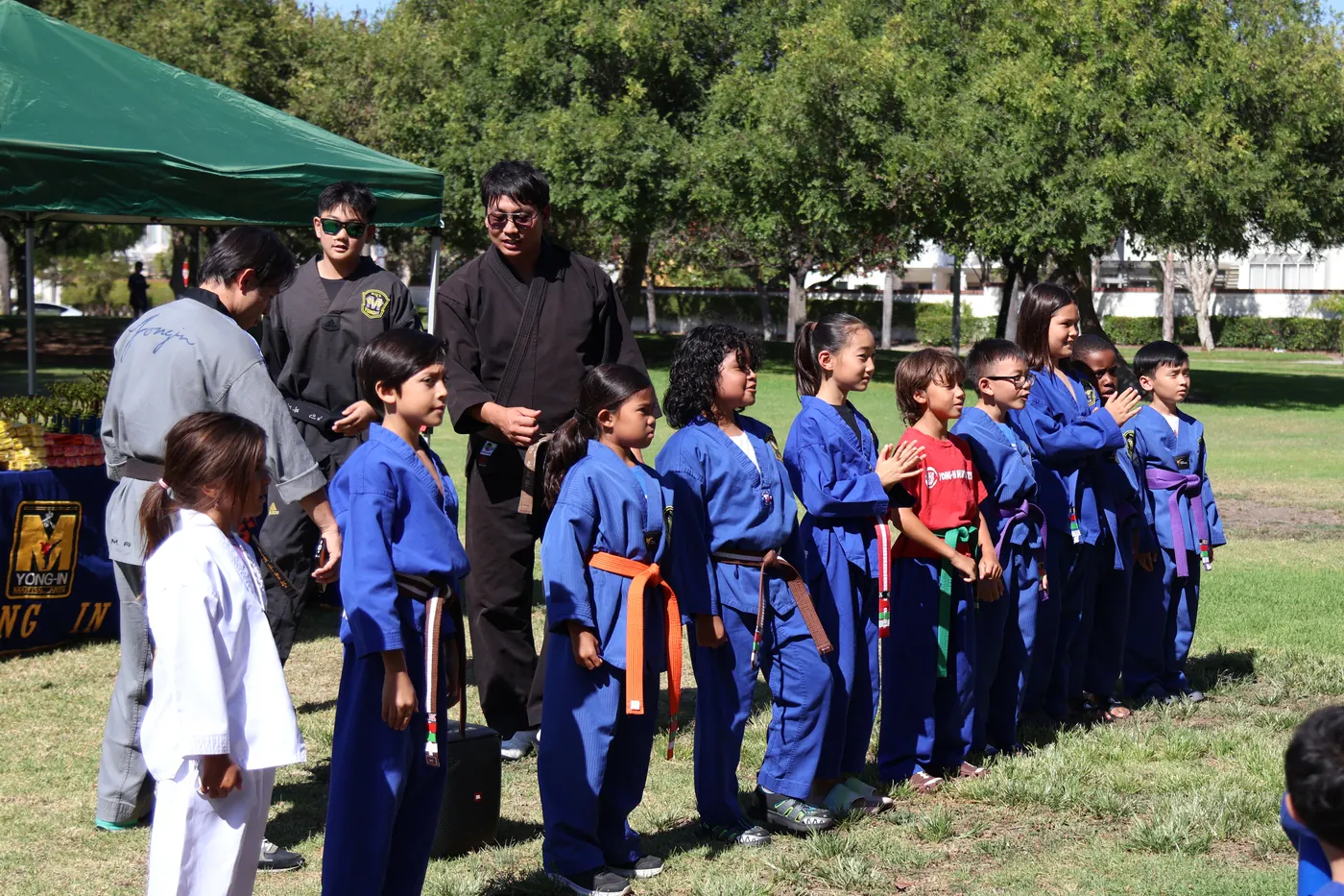 Students lined up at a community park event