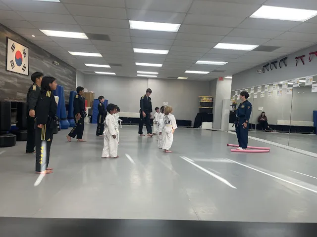Little Tigers lined up in the Cypress dojang